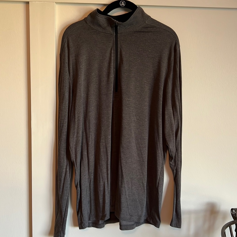 UA gray colored mens pull over with half zip. Size XL